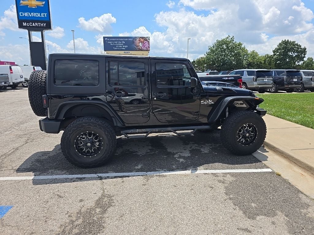 Certified 2015 Jeep Wrangler Unlimited Sport with VIN 1C4BJWDG4FL506082 for sale in Kansas City