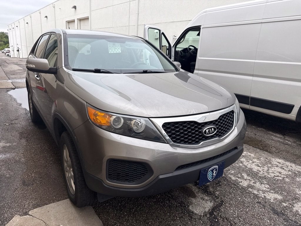 Used 2012 Kia Sorento LX with VIN 5XYKT3A12CG203060 for sale in Kansas City
